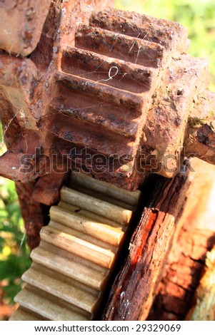 gears and cogs pulley. Rusty machine for winding cable for fishing net and boats