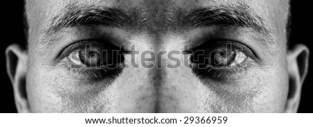 face of male and eyes. man staring and focus on camera
