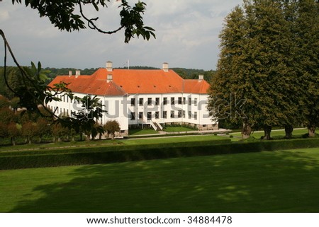 manor house in denmark. Clausholm castle and park with trees and garden. large danish estate in jutland