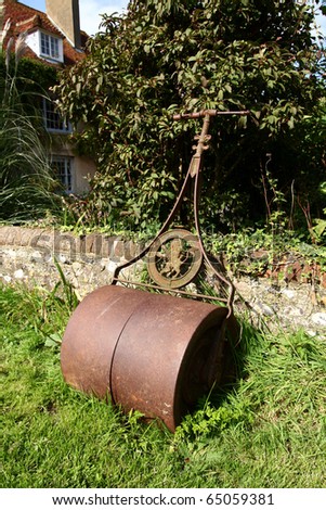 Garden Roller on Stock Photo   Garden Or Lawn Roller In Rusty Iron Left By Stone Wall