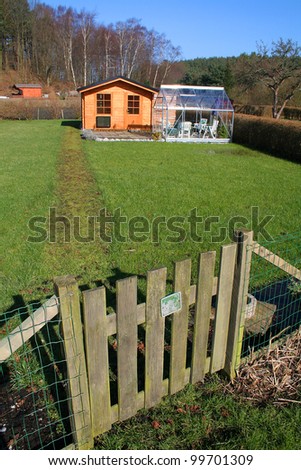 allotment and greenhouse, plot of land with building or cabins