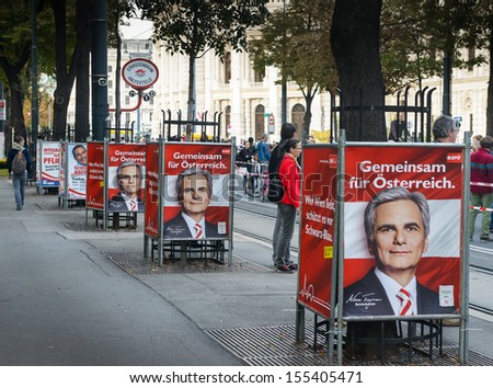 WIEN, AUSTRIA - 22 SEPTEMBER 2013: election posters during the election campaign for the election of the Austrian National Assembly on Sept 29 2013.Wien, Sept 22 2013