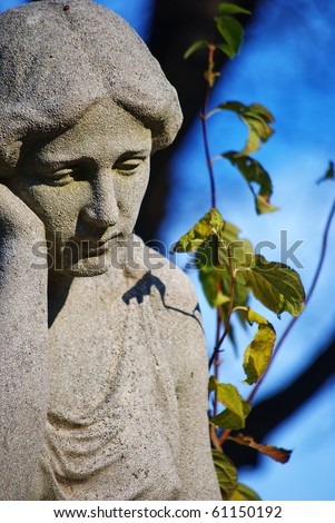 Sad woman-old tombstone on Central Cemetery in Vienna,Austria.