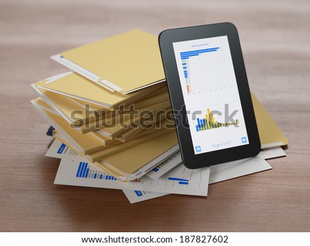 Business reports both on paper and tablet screen