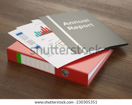 Annual report folders with graphs and charts close-up