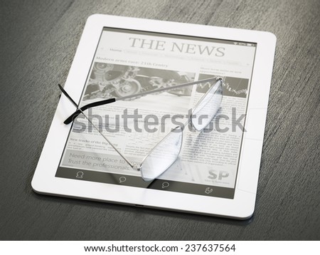 E-reader with newspaper application and glasses