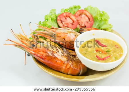 fresh water prawn grilled on fire ready to eat on brown dish