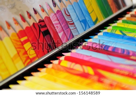 Set of multicoloured pencils in a tin gift box
