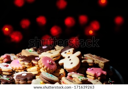Christmas cookies and cakes in warm lights
