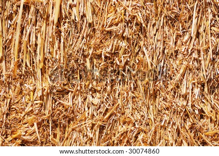 Abstract background of a tightly packed bale of straw