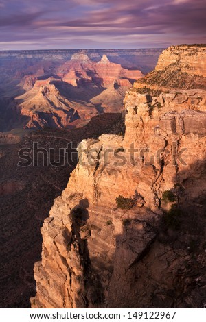 This file of a majestic sunset photo at the South Rim of the Grand Canyon captures the amazing layers of landscape and quality of light
