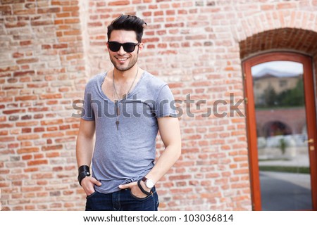 attractive young male model smiling
