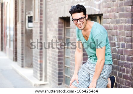 handsome man smiling on the street
