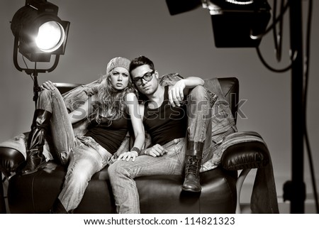 http://image.shutterstock.com/display_pic_with_logo/173680/114821323/stock-photo-sexy-man-and-woman-doing-a-fashion-photo-shoot-in-a-professional-studio-114821323.jpg