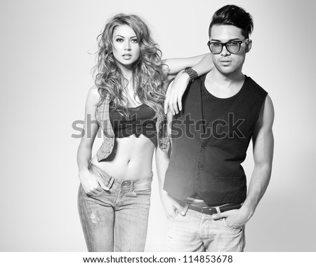 http://image.shutterstock.com/display_pic_with_logo/173680/114853678/stock-photo-sexy-man-and-woman-doing-a-fashion-photo-shoot-in-a-professional-studio-bw-retro-look-114853678.jpg