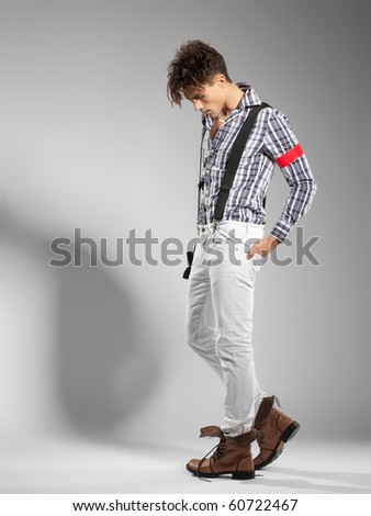 very attractive young male model looking away - clean studio shoot - copy space