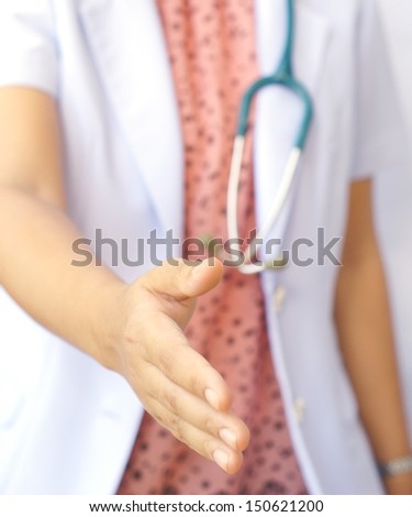 doctor offering her handshake
