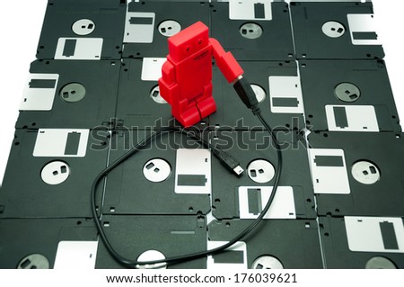 Old floppy disk, and USB port ,memory innovation concept
