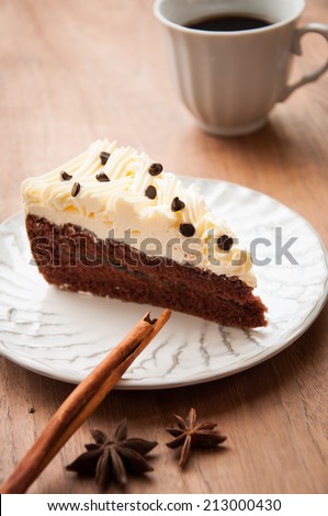 Slice piece of vanilla cake topping with white chocolate chips for coffee or tea break, an image isolated on white
