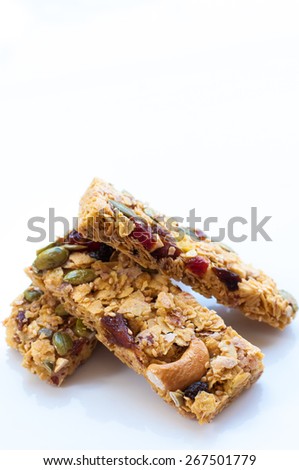 Healthy Snack : Cereal Bars : germinate rice whole grains with fruits on white background, Multigrain Bar