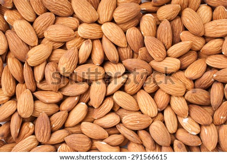 Peeled almonds closeup. For vegetarians.