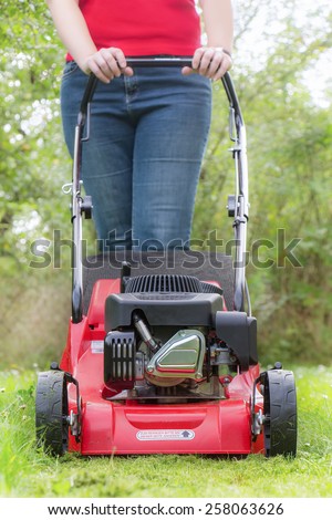 Lawn mowing with petrol lawn mower