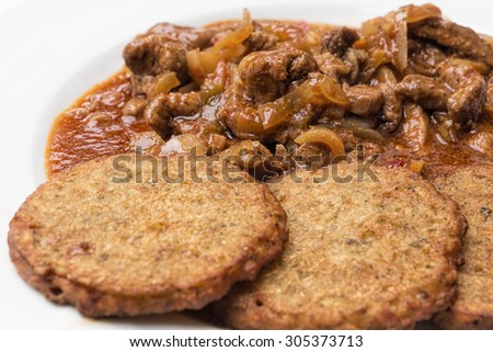 Potato pancakes with meat mixture, typical Czech or German meal or dish.