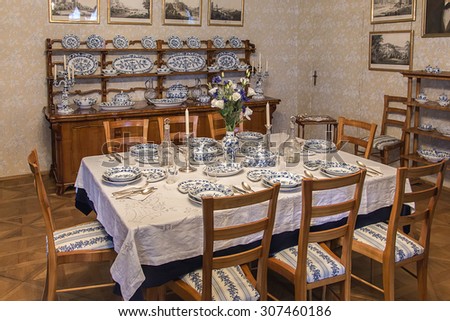 Rozumberk Castle, Czech Republic - August 2, 2015: The dining room in Biedermeier interior, the beginning of 19. century, illustrating the life style of rich in central Europe of that time.