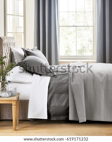 Modern bedroom interior with double bed. Design bedroom interior in luxury apartment
