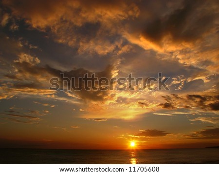 Evening sky with clouds on sea sunset