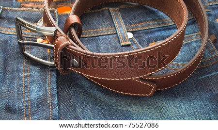 Blue male jeans with leather fashion belt
