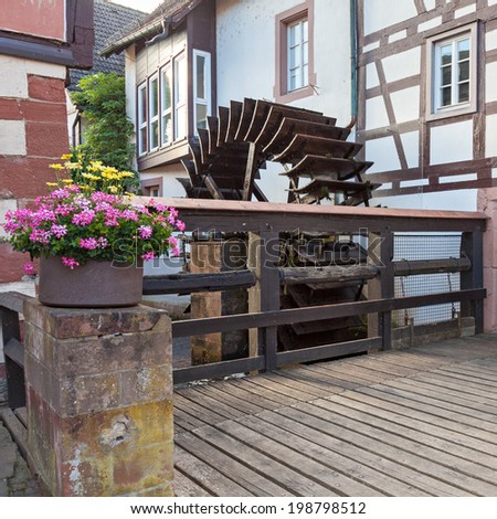 ANNWEILER, GERMANY - JUNE 14, 2014: The picturesque village Annweiler in Germany with its old houses built in half-timber style.