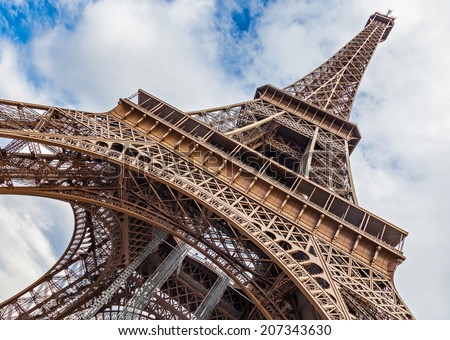 PARIS, FRANCE - AUGUST 22, 2012: The Eiffel Tower Tourist Attraction in Paris, view from below