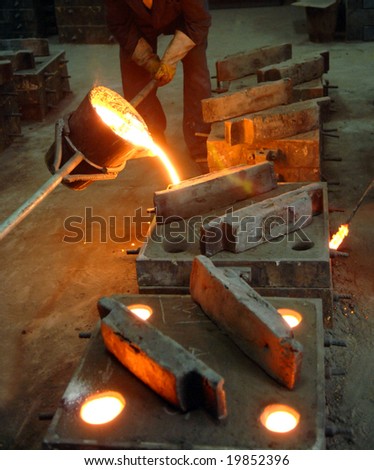 Workman in iron factory