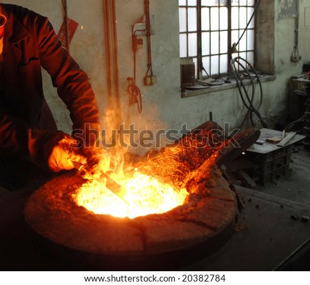 Men work in iron factory