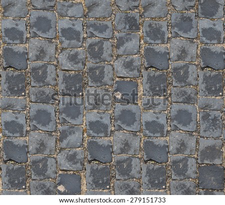 Gray Old Paving Stone Closeup. Seamless Tileable Texture. Grey Stone Block Seamless Texture. Small cobblestone sidewalk made of cubic stones