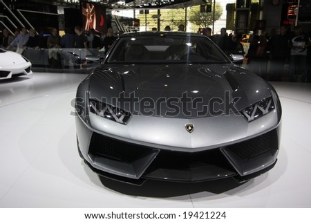 PARIS - OCTOBER 13 : People look at the Lamborghini Estoque at the 2008 Paris Motor Show October 13, 2008 in Paris. The show attracts more of one million people every 2 years