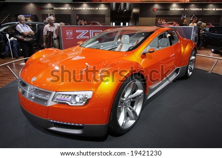 PARIS - OCTOBER 13 : People look at the crysler concept car at the 2008 Paris Motor Show October 13, 2008 in Paris. The show attracts more of one million people every 2 years