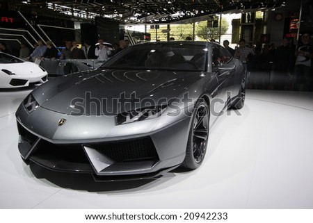 PARIS - OCTOBER 13 : People look at the Lamborghini Estoque at the 2008 Paris Motor Show October 13, 2008 in Paris. The show attracts more of one million people every 2 years