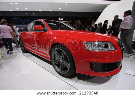 PARIS - OCTOBER 13 : People look at the Audi S5 at the 2008 Paris Motor Show October 13, 2008 in Paris. The show attracts more of one million people every 2 years