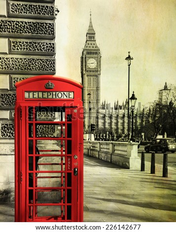 A red telephone booth in the foreground with the Big Ben behind