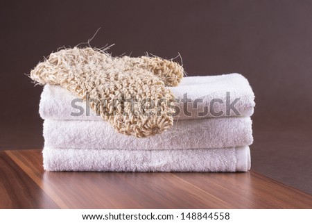 Clean and fresh idea - massage glove and white towels