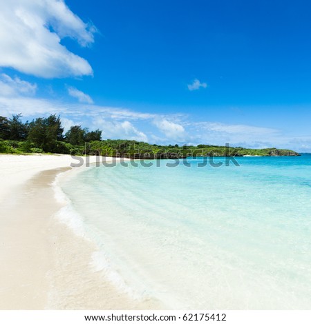 Deserted tropical island beach with clear blue coral water, Miyako Islands, Okinawa, Japan