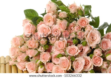 Bouquet of roses on stick straw mat