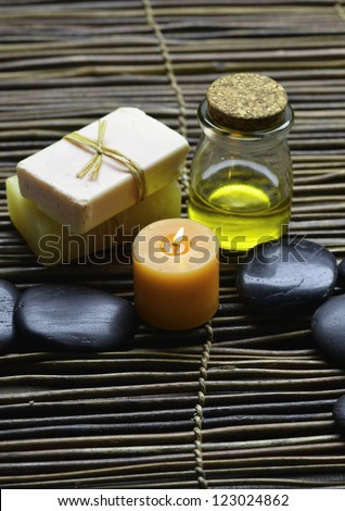 Zen rock and Handmade soap with candle, massage oil