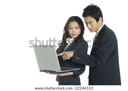 young business couple with laptop on white