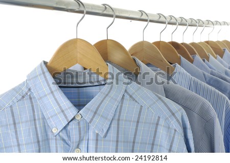 Dress shirts on wooden hangers
