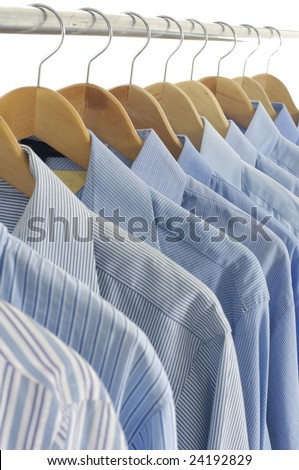 Dress shirts on wooden hangers