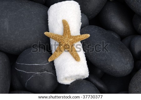 Time to relax stones, and candle, starfish