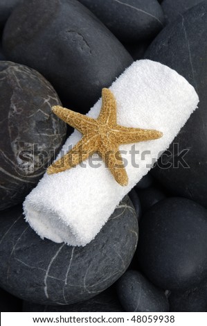 Time to relax- stones, and candle, starfish